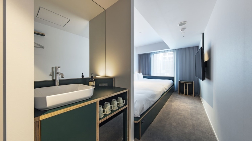 Imagen de la habitación del Hotel All Day Place Shibuya. Foto 7