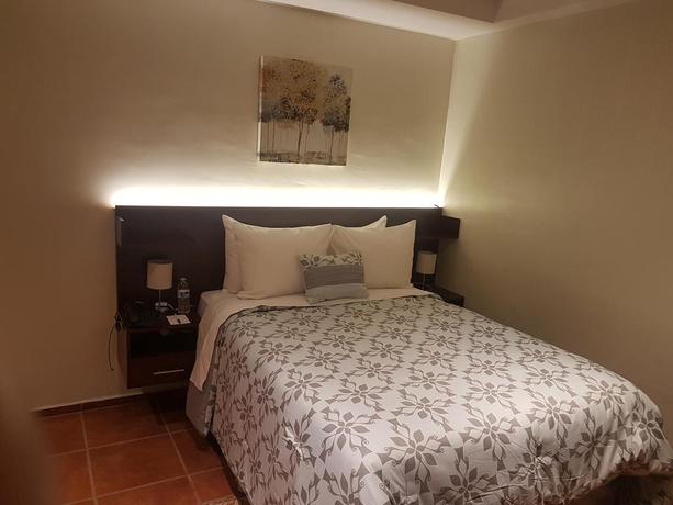 Imagen de la habitación del Hotel All Days Inn and Out. Foto 8