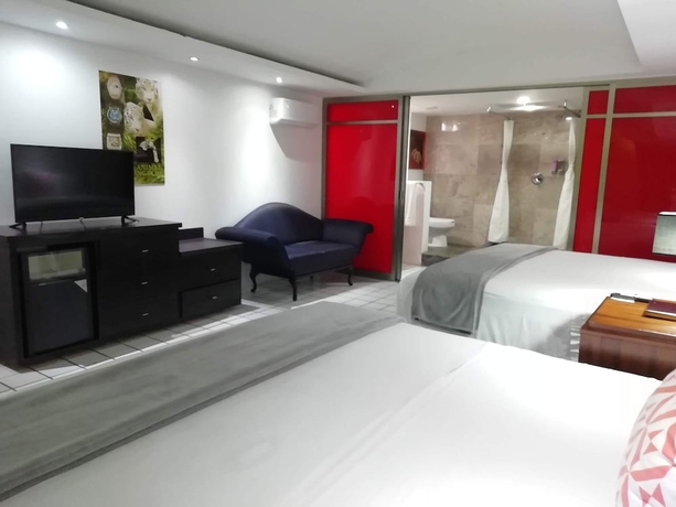 Imagen de la habitación del Hotel All Inclusive MDH. Foto 7