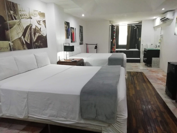 Imagen de la habitación del Hotel All Inclusive MDH. Foto 10