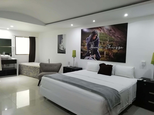 Imagen de la habitación del Hotel All Inclusive MDH. Foto 11
