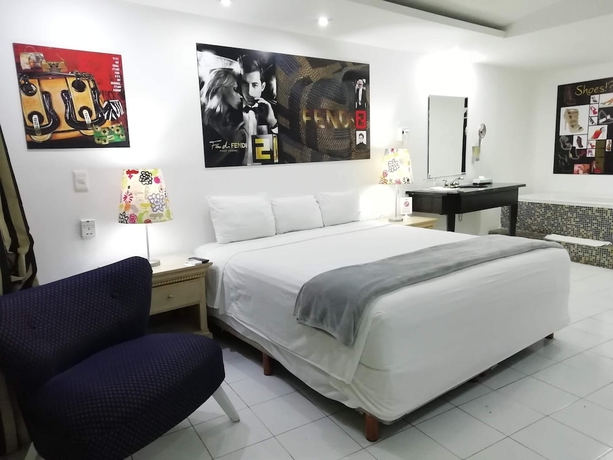 Imagen de la habitación del Hotel All Inclusive MDH. Foto 12