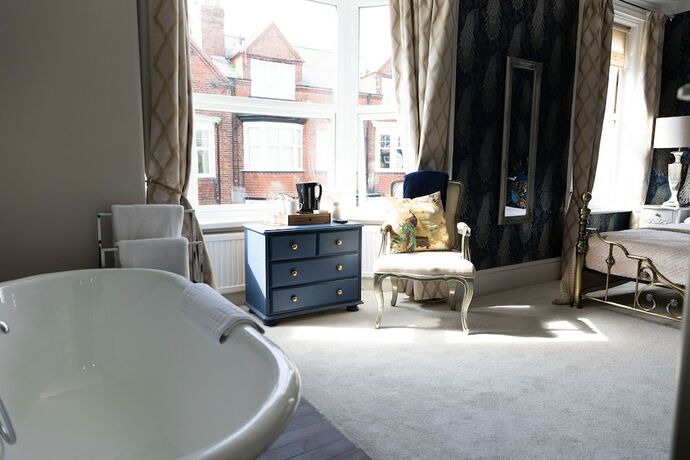 Imagen de la habitación del Hotel All Seasons Boutiques. Foto 12