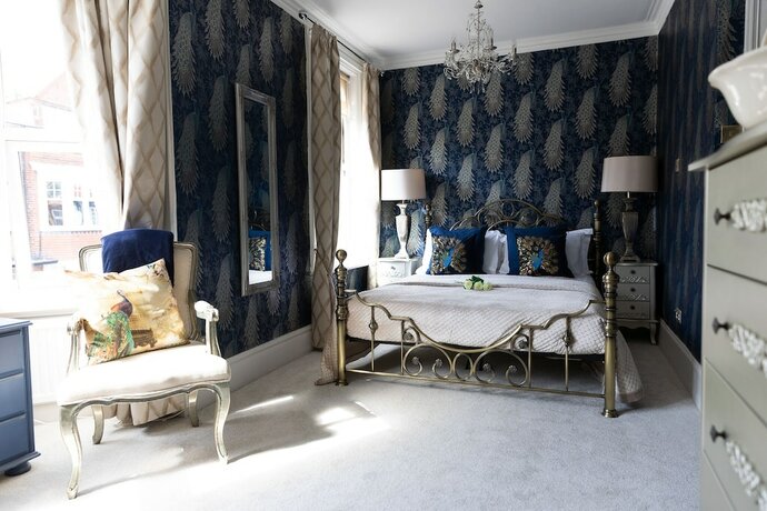 Imagen de la habitación del Hotel All Seasons Boutiques. Foto 14