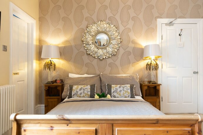 Imagen de la habitación del Hotel All Seasons Boutiques. Foto 16