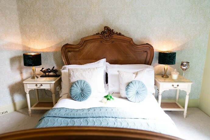 Imagen de la habitación del Hotel All Seasons Boutiques. Foto 17