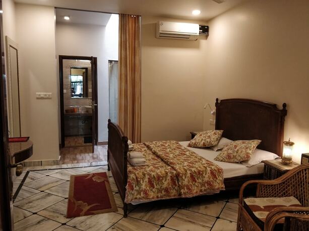 Imagen de la habitación del Hotel All Seasons Homestay. Foto 17