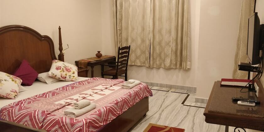 Imagen de la habitación del Hotel All Seasons Homestay. Foto 18