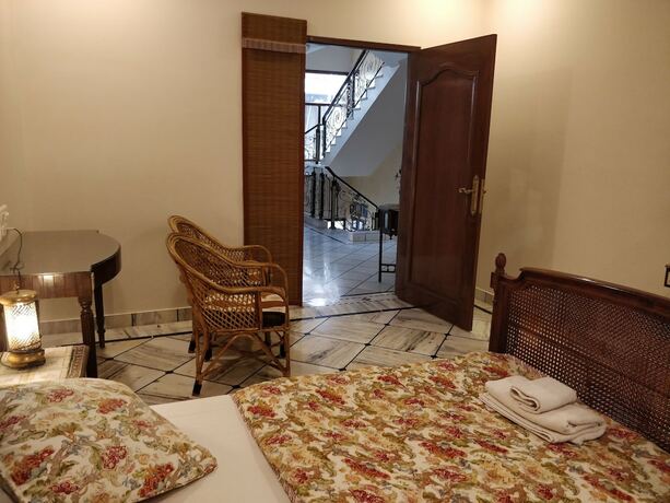 Imagen de la habitación del Hotel All Seasons Homestay. Foto 20