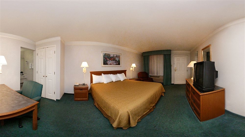 Imagen de la habitación del Hotel All Seasons Inn & Suites. Foto 3