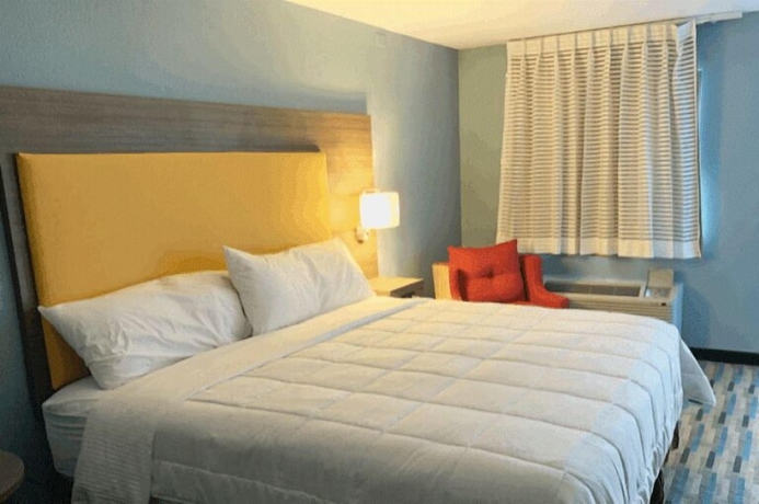 Imagen de la habitación del Hotel All Seasons Inn & Suites. Foto 4