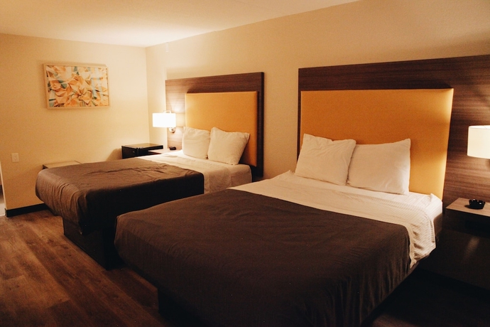Imagen de la habitación del Hotel All Seasons Inn & Suites. Foto 6
