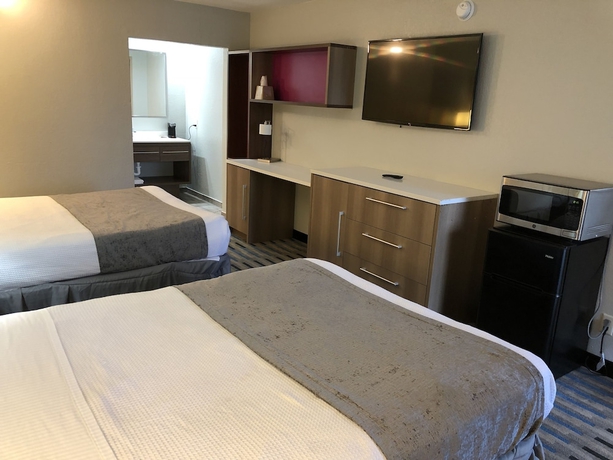 Imagen de la habitación del Hotel All Seasons Inn & Suites. Foto 7