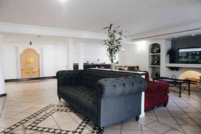 Imagen de los interiores del Hotel All Seasons Inn & Suites. Foto 16
