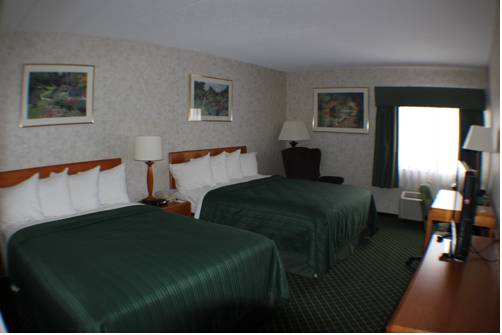Imagen de la habitación del Hotel All Seasons Inn and Suites. Foto 1