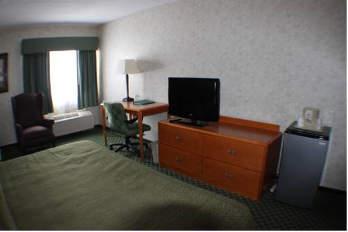 Imagen de la habitación del Hotel All Seasons Inn and Suites. Foto 3