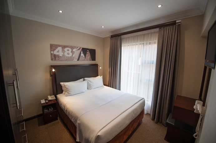Imagen de la habitación del Hotel All Suite on 14th. Foto 4