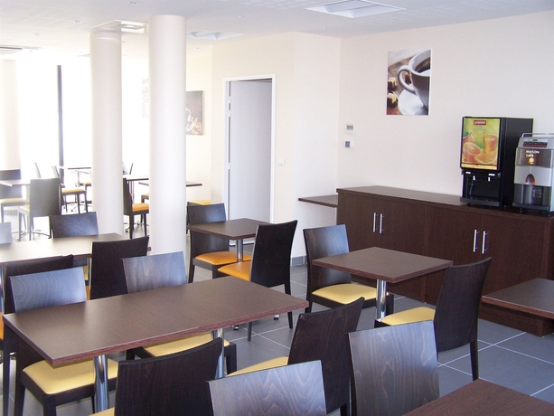 Imagen del bar/restaurante del Hotel All Suites Appart Pau. Foto 2