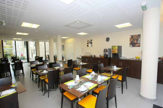 Imagen del bar/restaurante del Hotel All Suites Appart Pau. Foto 3