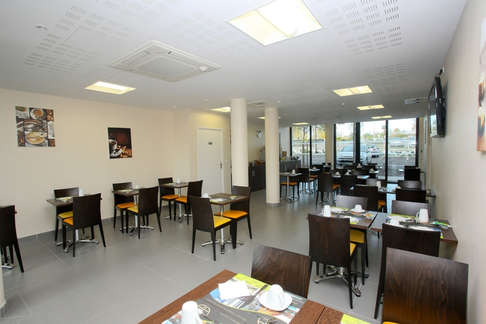 Imagen del bar/restaurante del Hotel All Suites Appart Pau. Foto 4