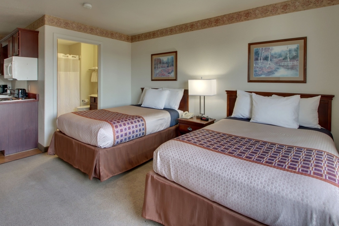 Imagen de la habitación del Hotel All Towne Suites. Foto 1