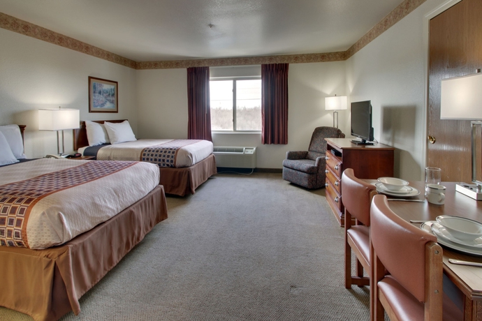 Imagen de la habitación del Hotel All Towne Suites. Foto 7