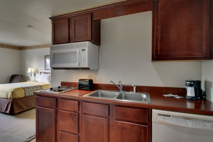 Imagen de la habitación del Hotel All Towne Suites. Foto 11