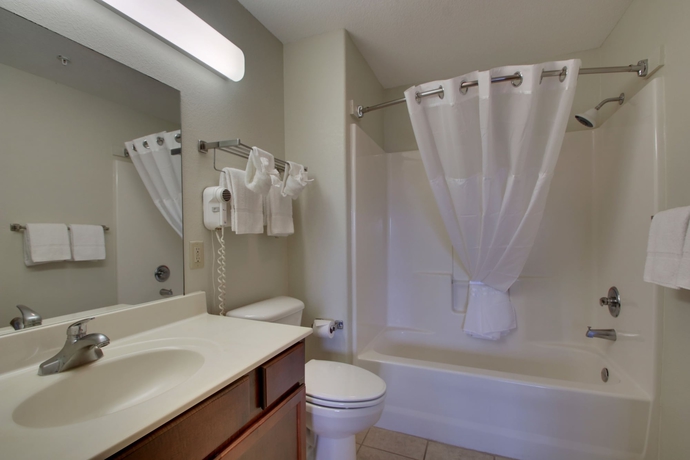 Imagen de la habitación del Hotel All Towne Suites. Foto 13
