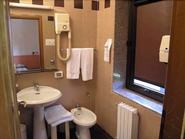 Imagen de la habitación del Hotel Alla Bianca. Foto 11