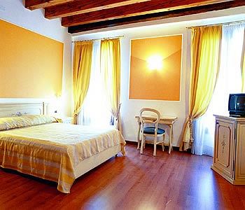 Imagen de la habitación del Hotel Alla Corte Rossa. Foto 4