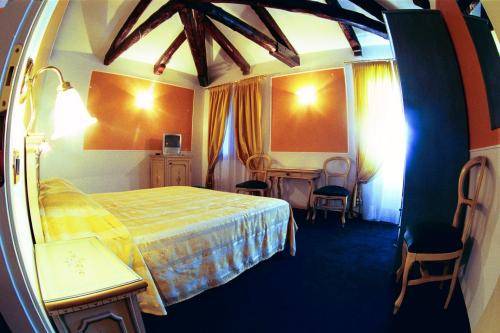 Imagen de la habitación del Hotel Alla Corte Rossa. Foto 7