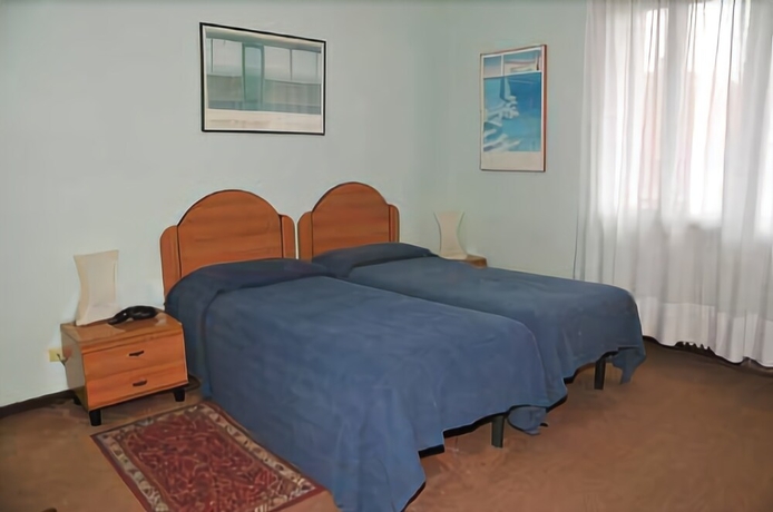 Imagen de la habitación del Hotel Alla Fiera. Foto 8