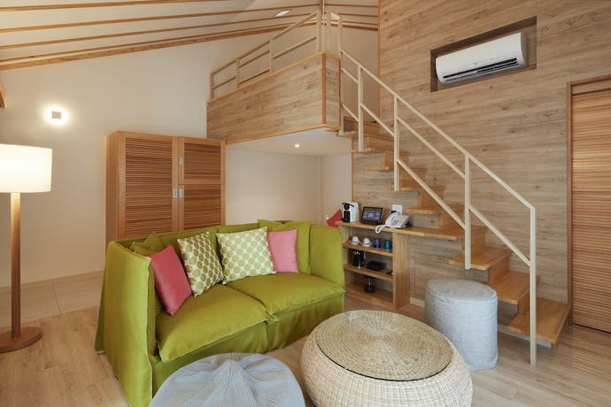 Imagen de la habitación del Hotel Allamanda Imgya Coral Village. Foto 2