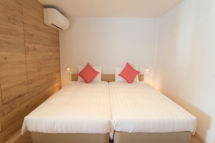 Imagen de la habitación del Hotel Allamanda Imgya Coral Village. Foto 3