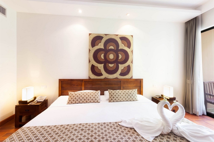 Imagen de la habitación del Hotel Allamanda Laguna Phuket. Foto 7