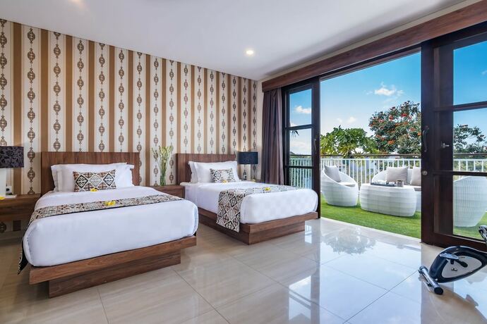 Imagen de la habitación del Hotel Allamanda Villa Jimbaran. Foto 12