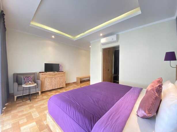 Imagen de la habitación del Hotel Allamanda Villa Jimbaran. Foto 16