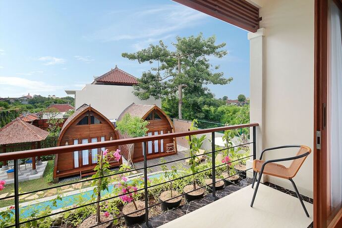 Imagen de la habitación del Hotel Allamanda Villa Jimbaran. Foto 19