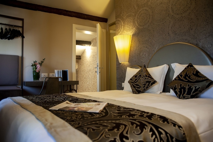 Imagen de la habitación del Hotel Alle Guglie Boutique. Foto 4