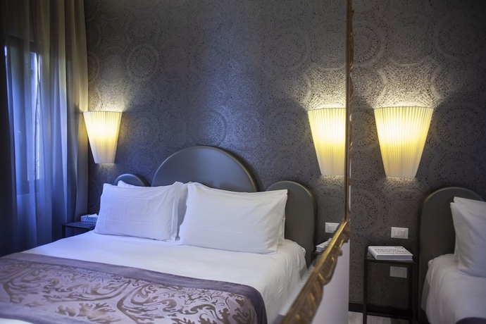 Imagen de la habitación del Hotel Alle Guglie Boutique. Foto 9