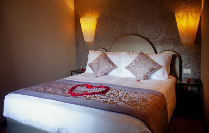 Imagen de la habitación del Hotel Alle Guglie Boutique. Foto 11