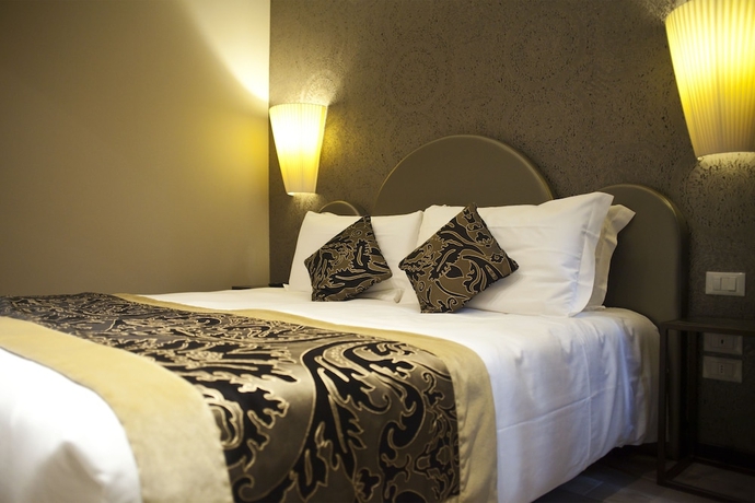 Imagen de la habitación del Hotel Alle Guglie Boutique. Foto 12