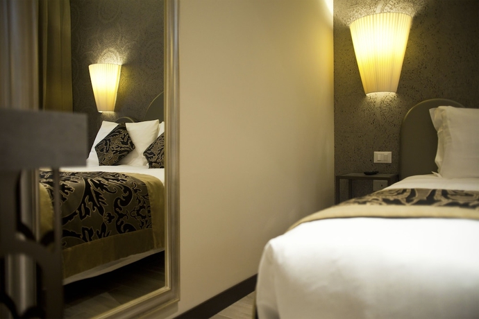 Imagen de la habitación del Hotel Alle Guglie Boutique. Foto 13