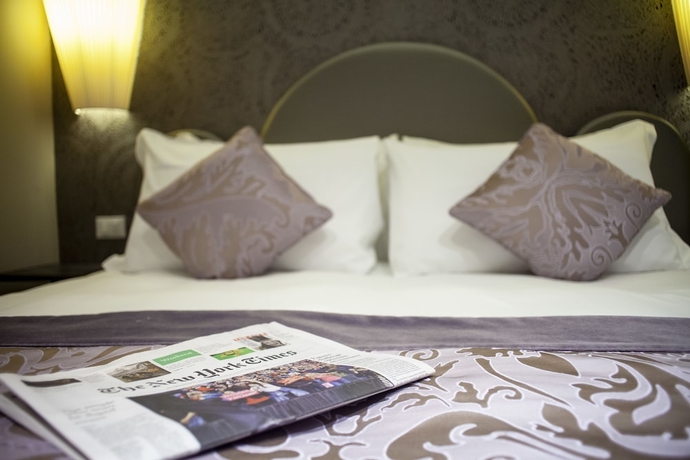 Imagen de la habitación del Hotel Alle Guglie Boutique. Foto 15