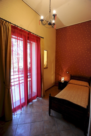 Imagen de la habitación del Hotel Alle Pendici. Foto 7