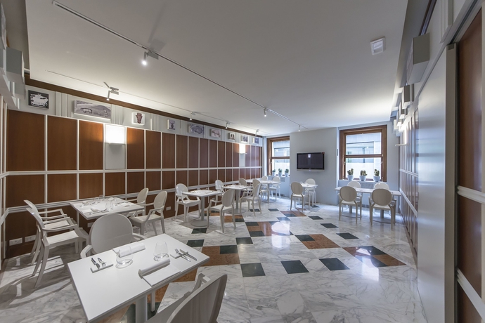 Imagen del bar/restaurante del Hotel Alli Due Buoi Rossi. Foto 5