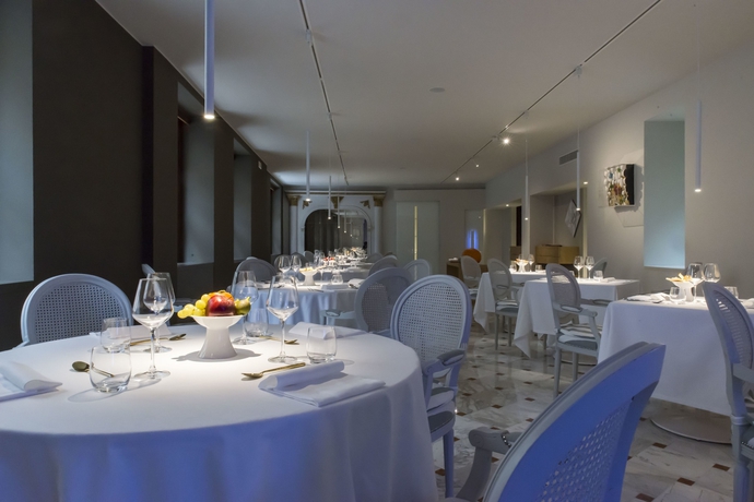 Imagen del bar/restaurante del Hotel Alli Due Buoi Rossi. Foto 8