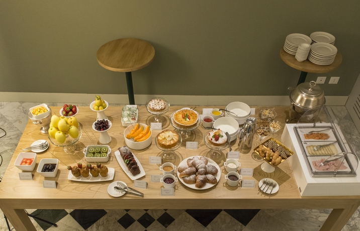 Imagen del bar/restaurante del Hotel Alli Due Buoi Rossi. Foto 11