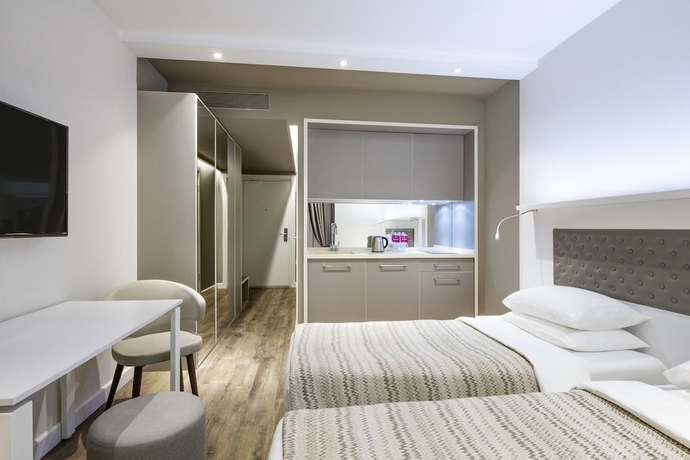 Imagen de la habitación del Hotel Alliance Palace Batumi. Foto 14