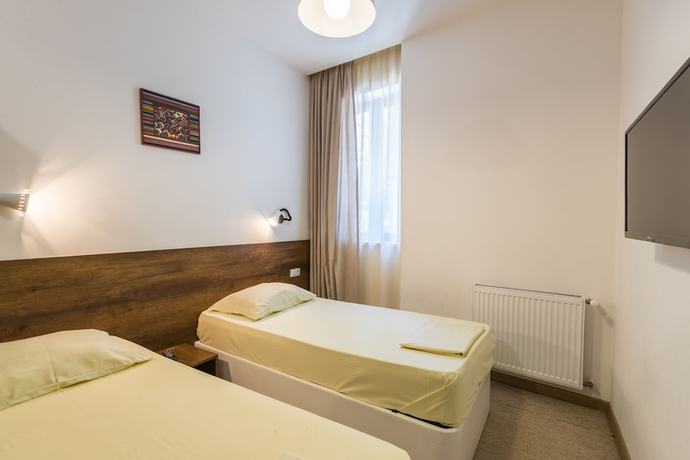 Imagen de la habitación del Hotel Alliance, Tbilisi. Foto 8